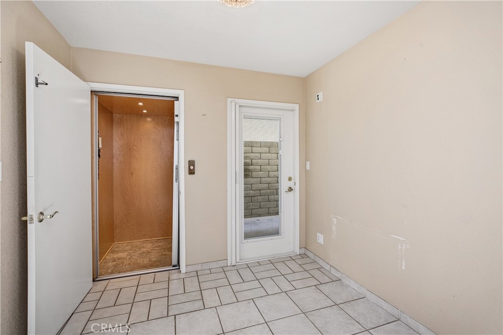 223 Orange Street Newport Beach, CA 92663 - Photo 13 of 51 an empty room with an entryway
