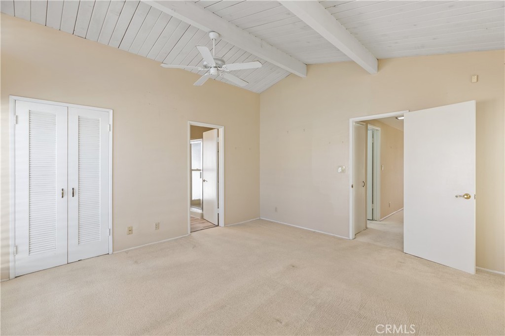 223 Orange Street Newport Beach, CA 92663 - Photo 24 of 51 a view of an empty room with a chandelier fan