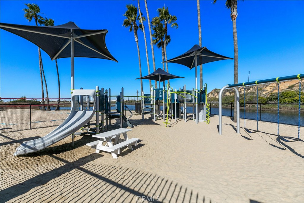 223 Orange Street Newport Beach, CA 92663 - Photo 41 of 51 a view of a swimming pool with a patio