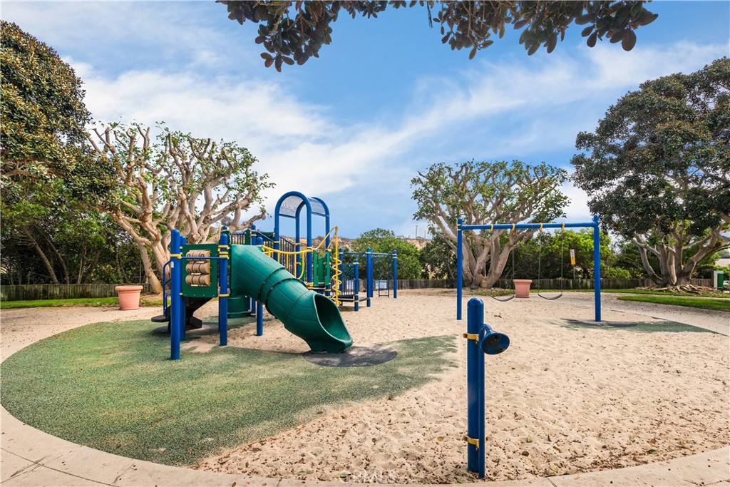 223 Orange Street Newport Beach, CA 92663 - Photo 51 of 51 a front view of a house with a yard and a garden