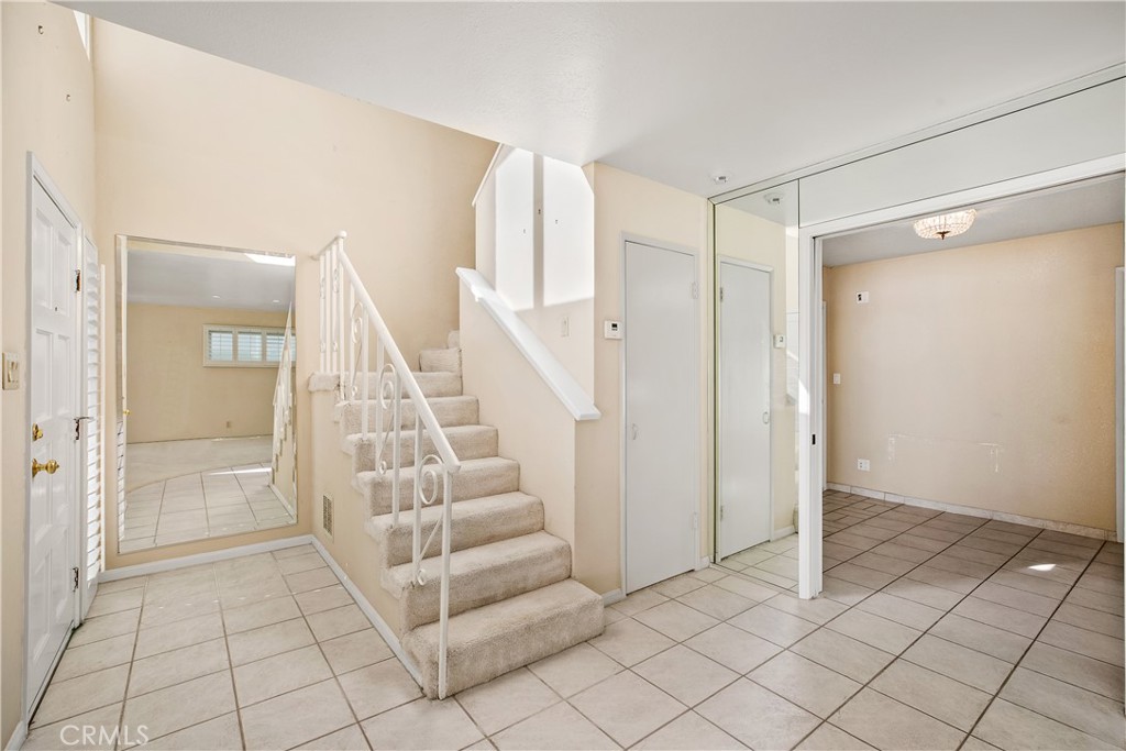 223 Orange Street Newport Beach, CA 92663 - Photo 7 of 51 a view of entryway with white walls and white doors