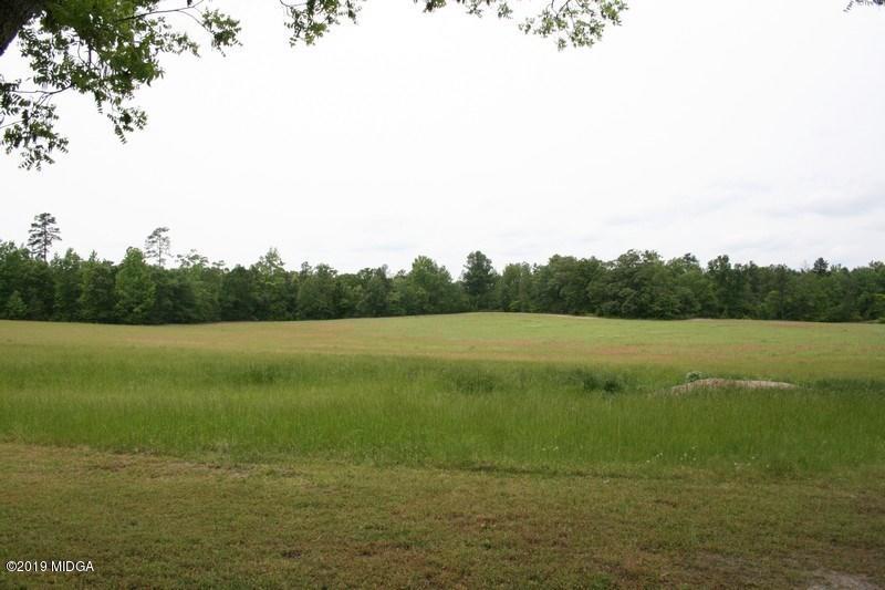 962 Durden Road Sandersville, GA 31082 - Photo 5 of 19 a view of lake with green space