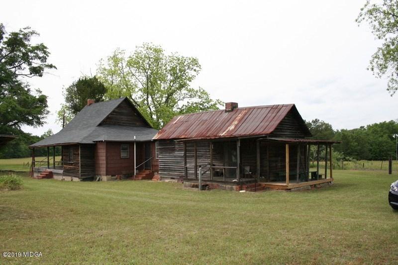 962 Durden Road Sandersville, GA 31082 - Photo 8 of 19 a front view of a house with a yard