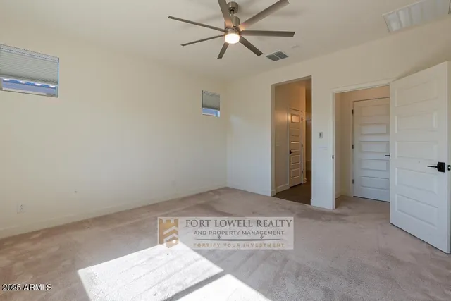 a view of a hallway with closet