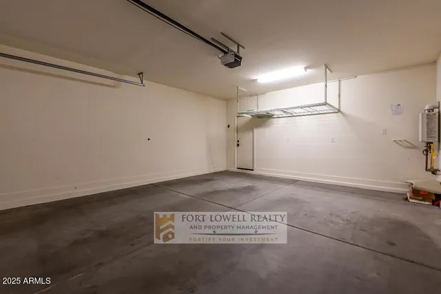 a view of a storage & utility room with window