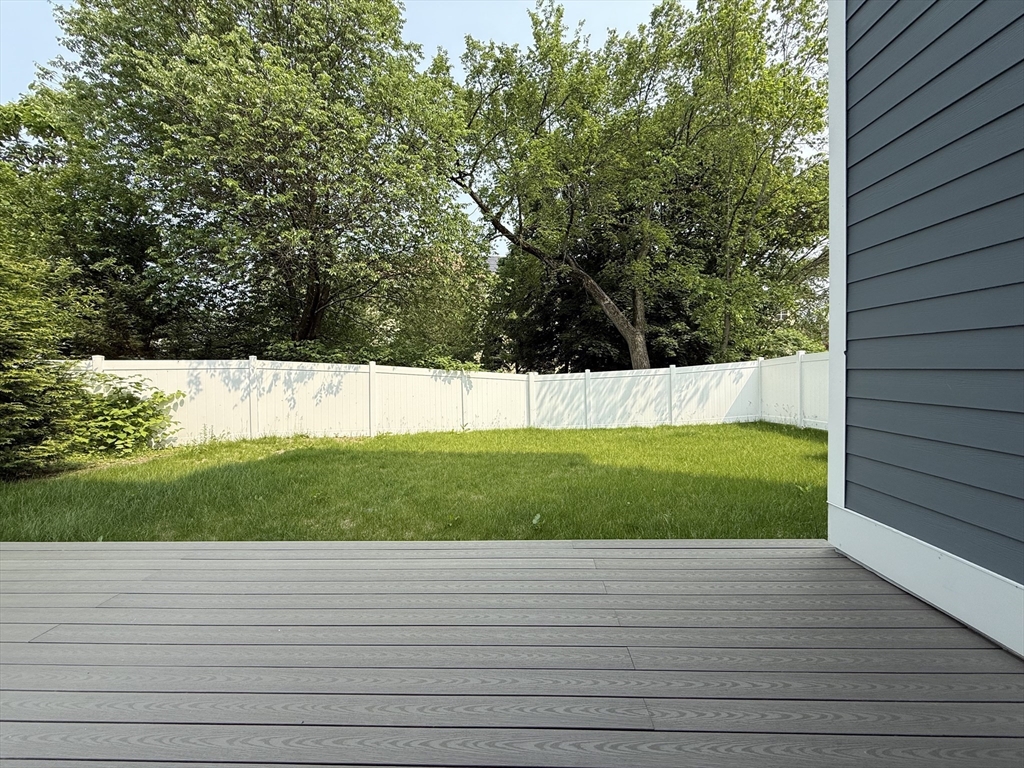 809-811 Heath Street, Unit 811 Brookline, MA 02467 - Photo 12 of 35 a view of a back yard