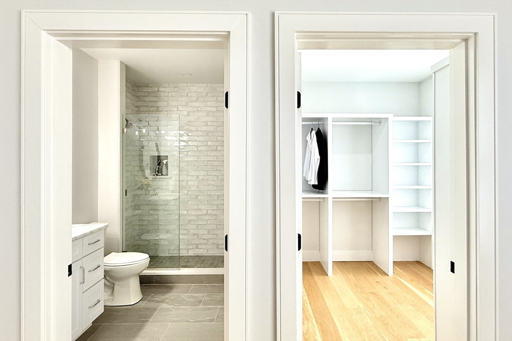 809-811 Heath Street, Unit 811 Brookline, MA 02467 - Photo 22 of 35 a bathroom with a toilet shower and a sink