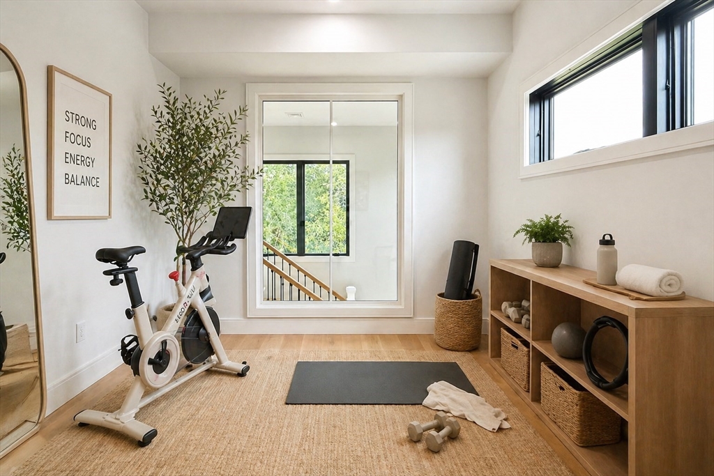 809-811 Heath Street, Unit 811 Brookline, MA 02467 - Photo 28 of 35 a view of a room with gym equipment