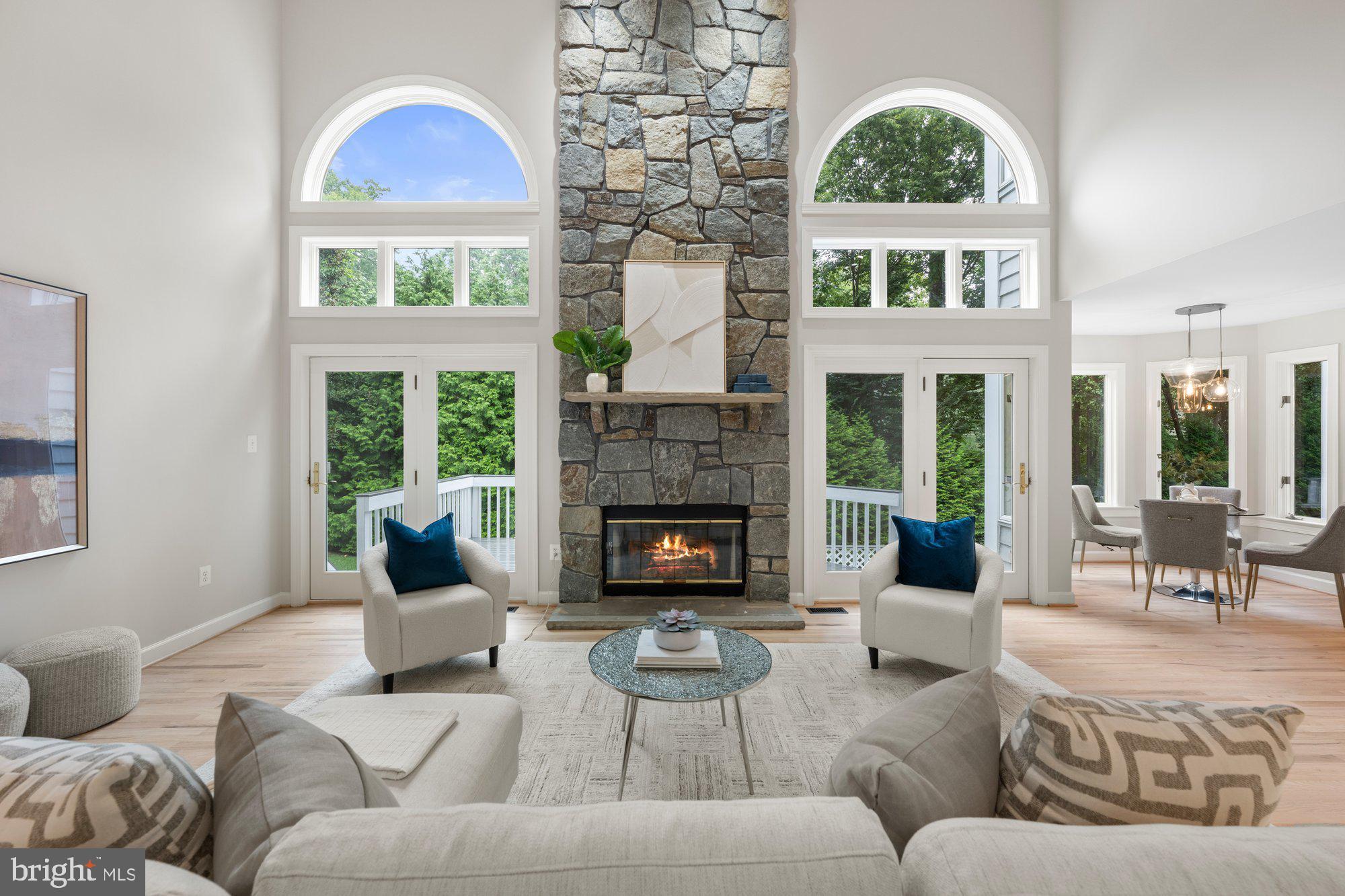 6856 St Albans Road McLean, VA 22101 - Photo 14 of 45 a living room with furniture large window and fireplace