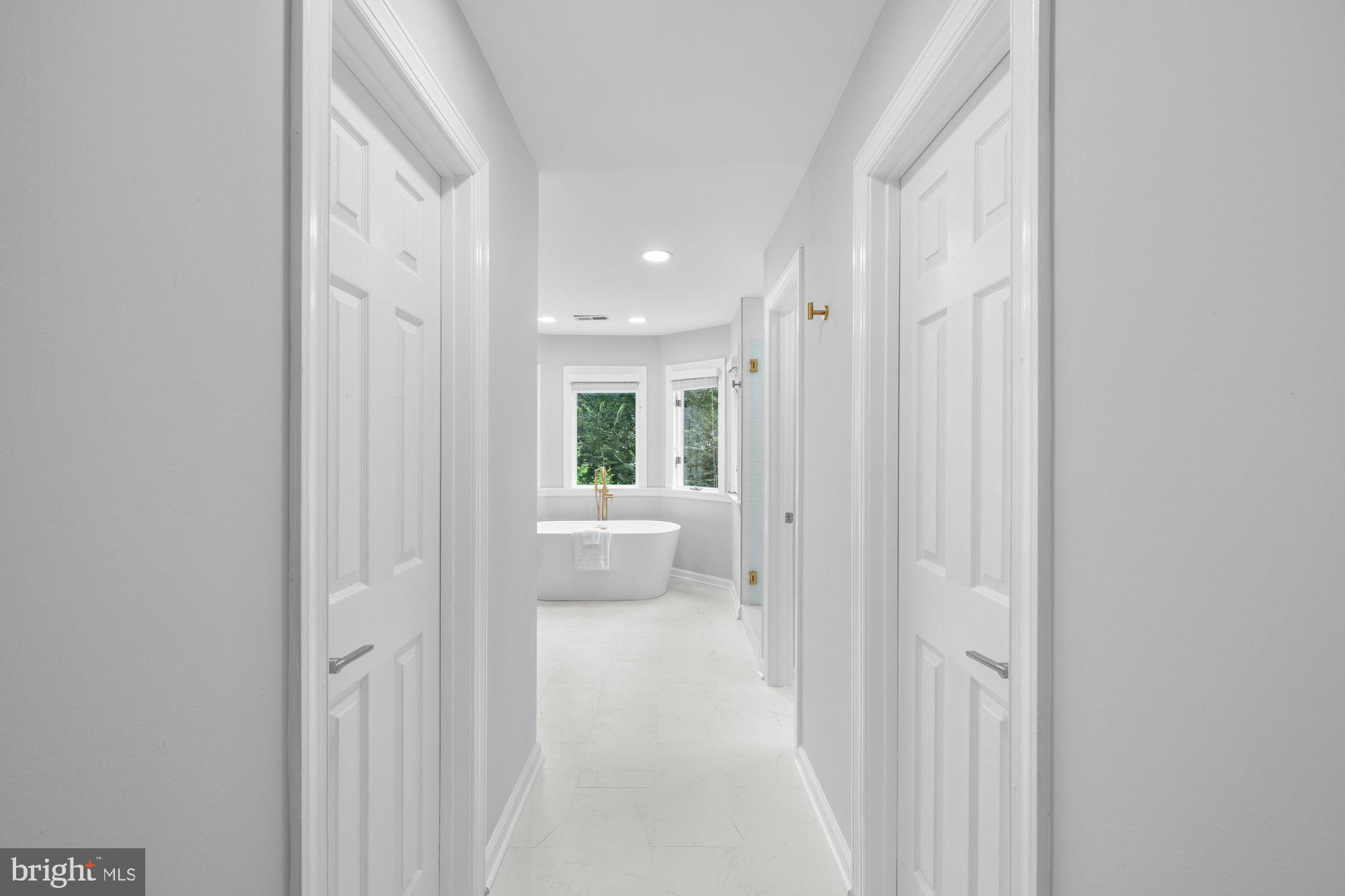 6856 St Albans Road McLean, VA 22101 - Photo 23 of 45 a bathroom with a toilet tub and shower