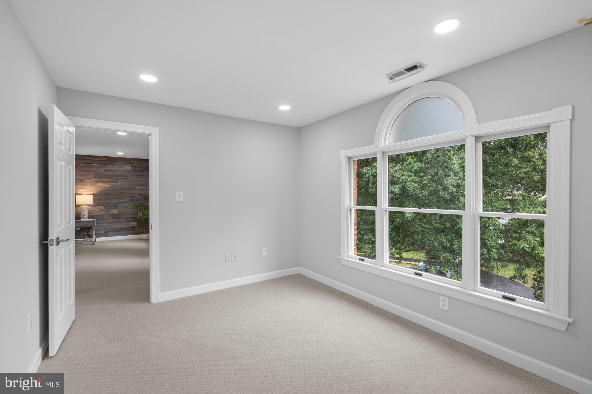 6856 St Albans Road McLean, VA 22101 - Photo 24 of 45 a view of an empty room and window