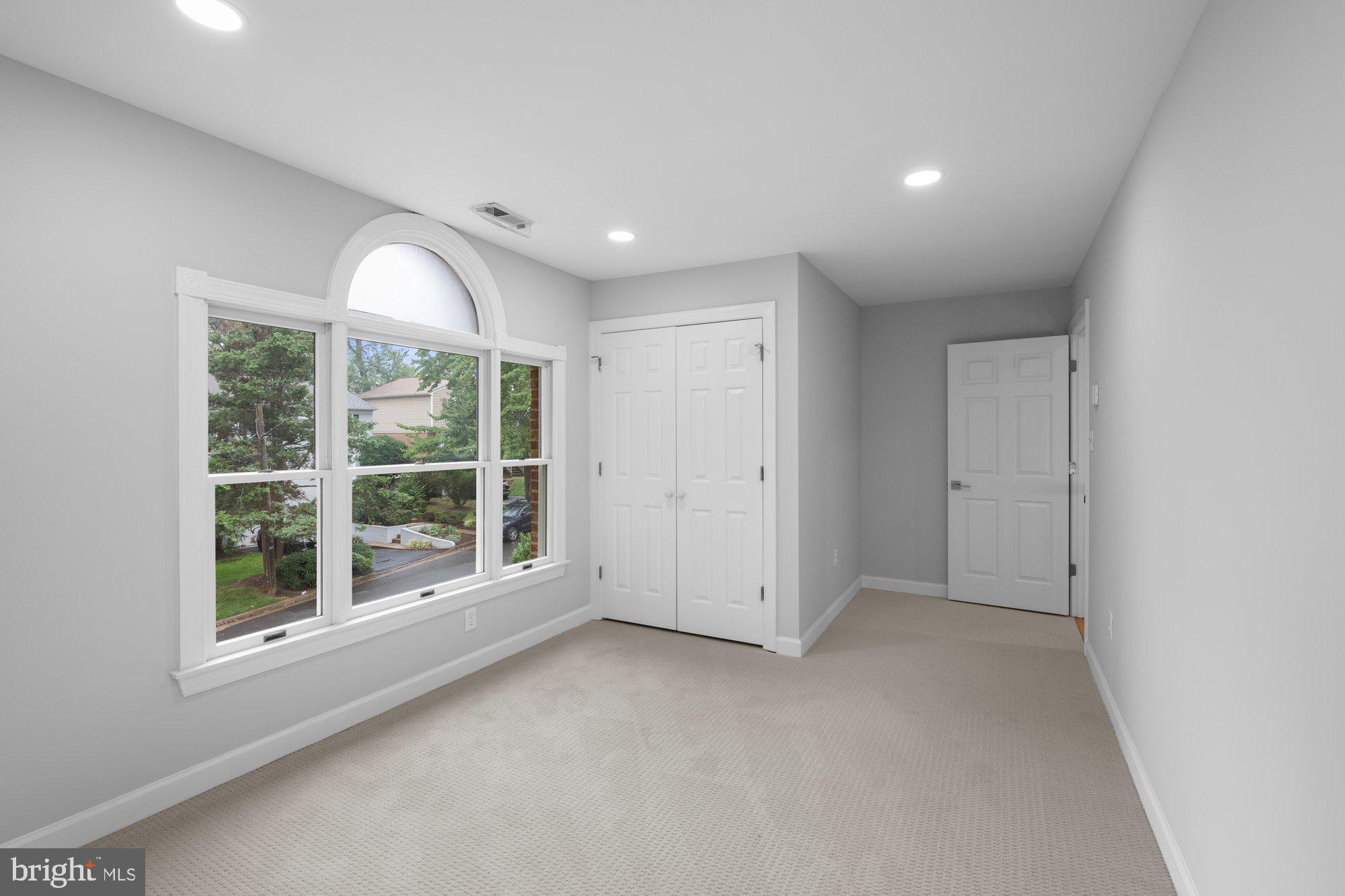 6856 St Albans Road McLean, VA 22101 - Photo 26 of 45 an empty room with windows