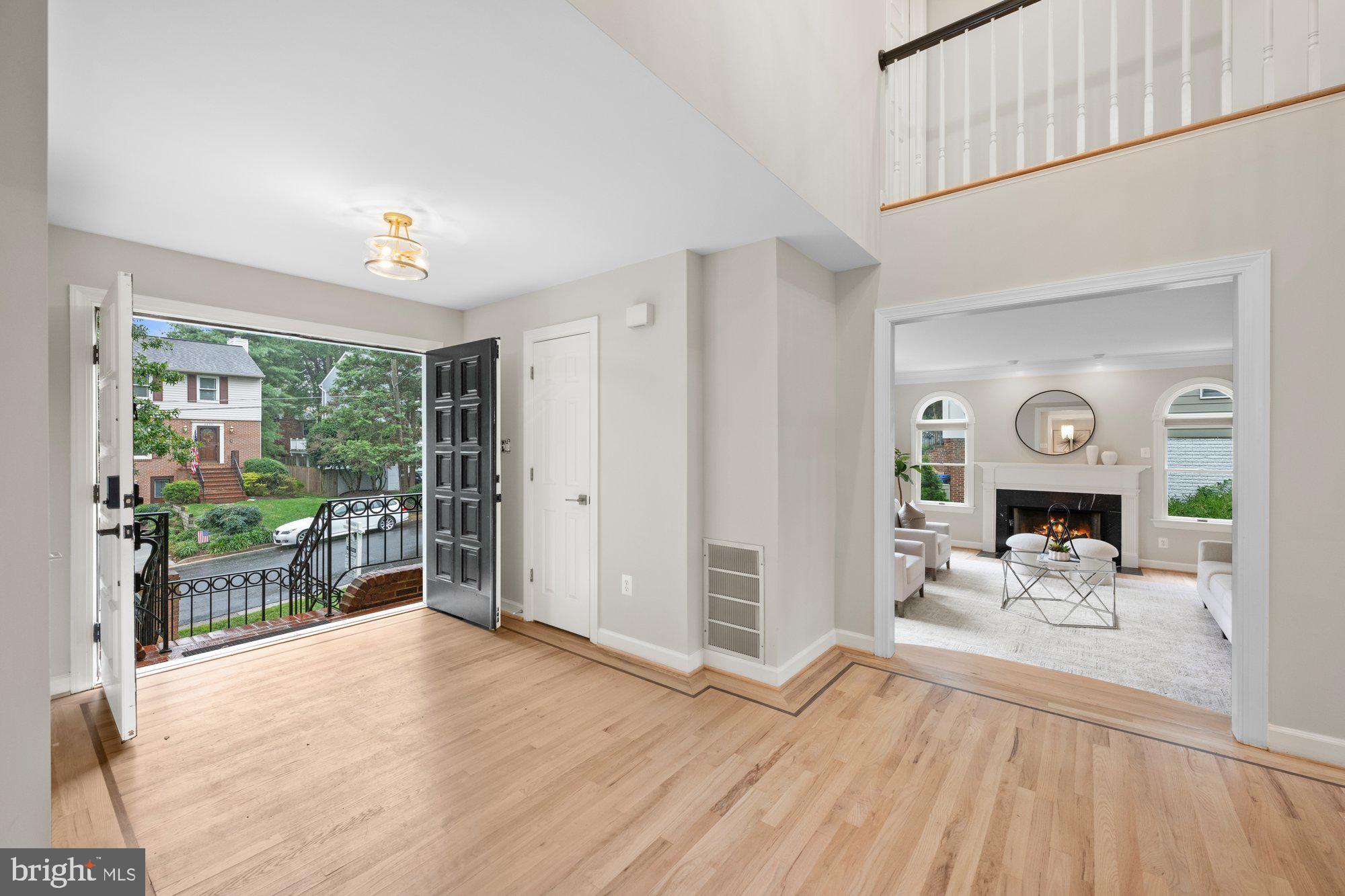 6856 St Albans Road McLean, VA 22101 - Photo 3 of 45 a view of a livingroom with wooden floor and furniture
