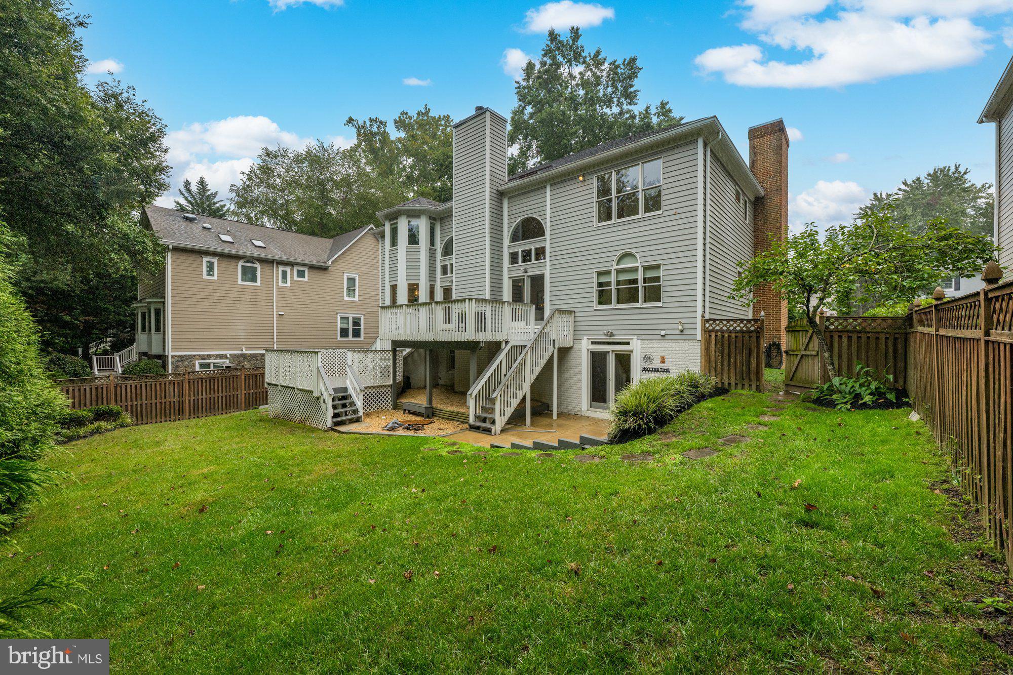 6856 St Albans Road McLean, VA 22101 - Photo 37 of 45 a view of a house with backyard and sitting area