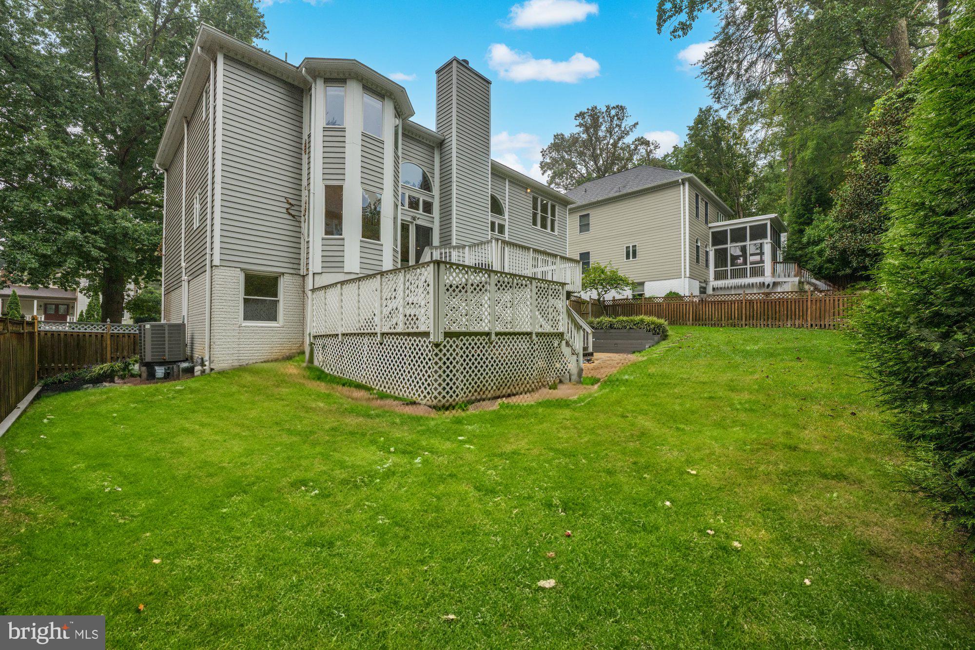 6856 St Albans Road McLean, VA 22101 - Photo 40 of 45 a view of a house with backyard and sitting area