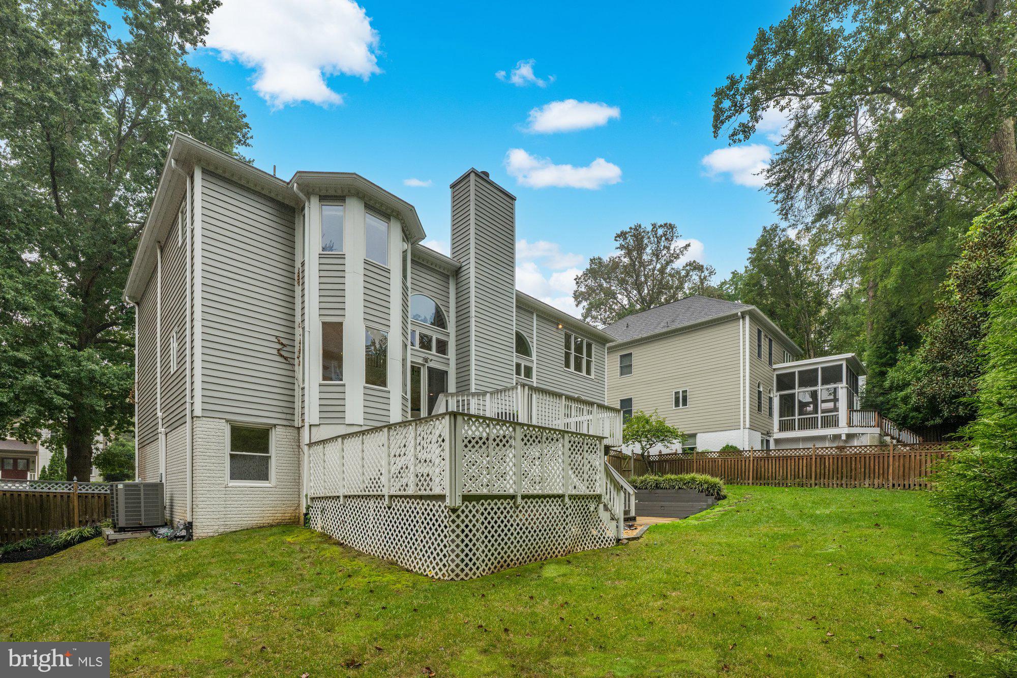 6856 St Albans Road McLean, VA 22101 - Photo 44 of 45 a view of a house with a yard porch and sitting area