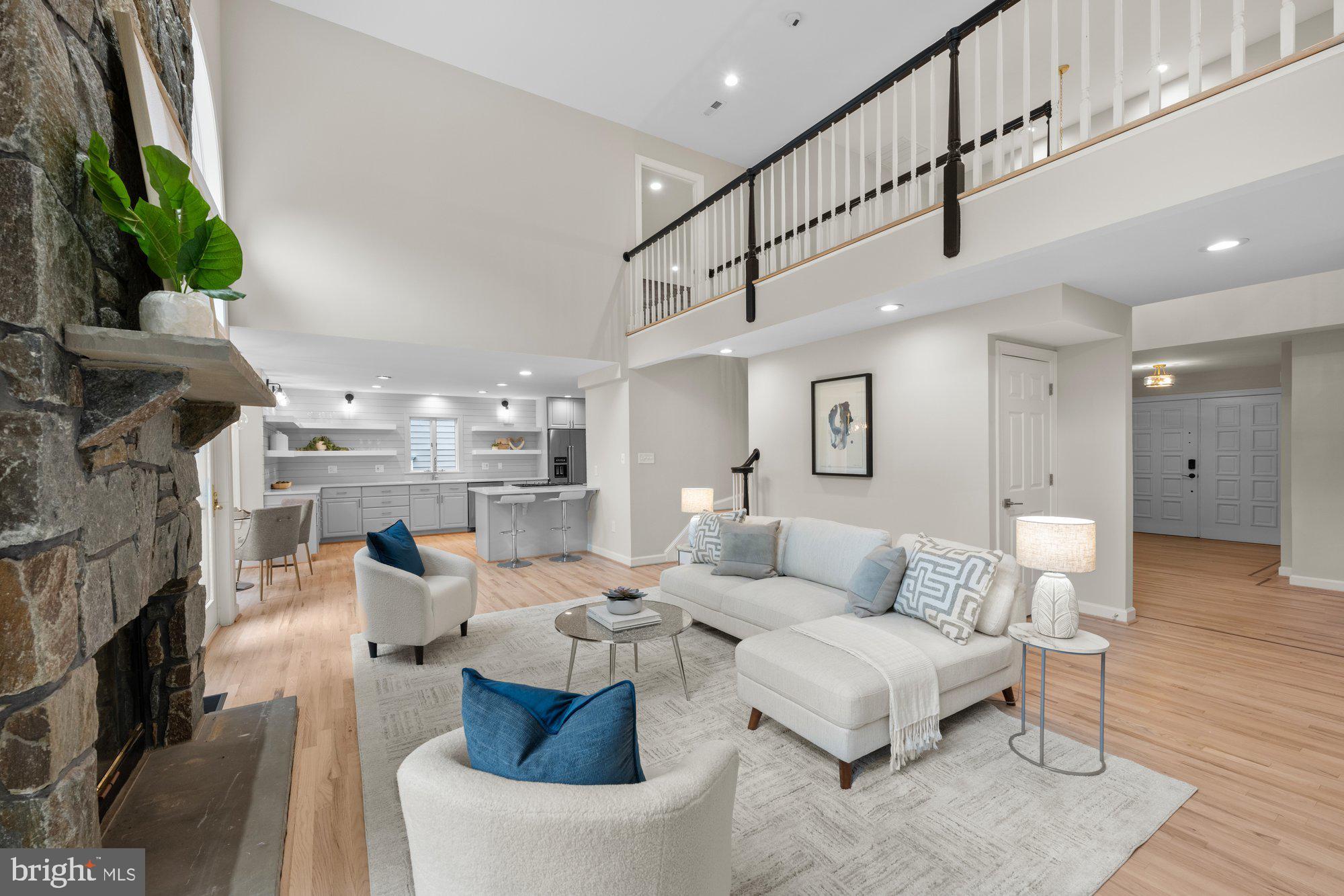 6856 St Albans Road McLean, VA 22101 - Photo 7 of 45 a living room with furniture and a fireplace