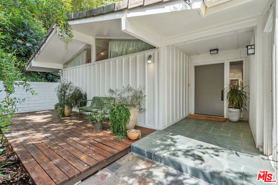 1827 Old Ranch Road Los Angeles, CA 90049 - Photo 3 of 39 a view of a backyard