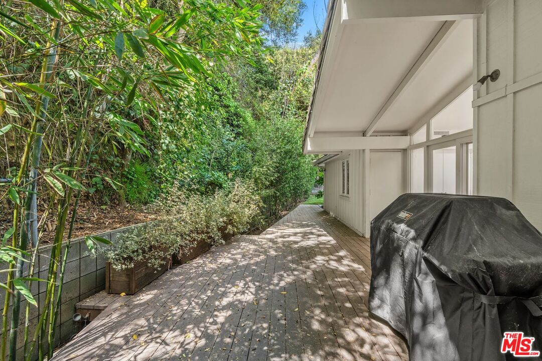 1827 Old Ranch Road Los Angeles, CA 90049 - Photo 39 of 39 a view of a backyard with furniture