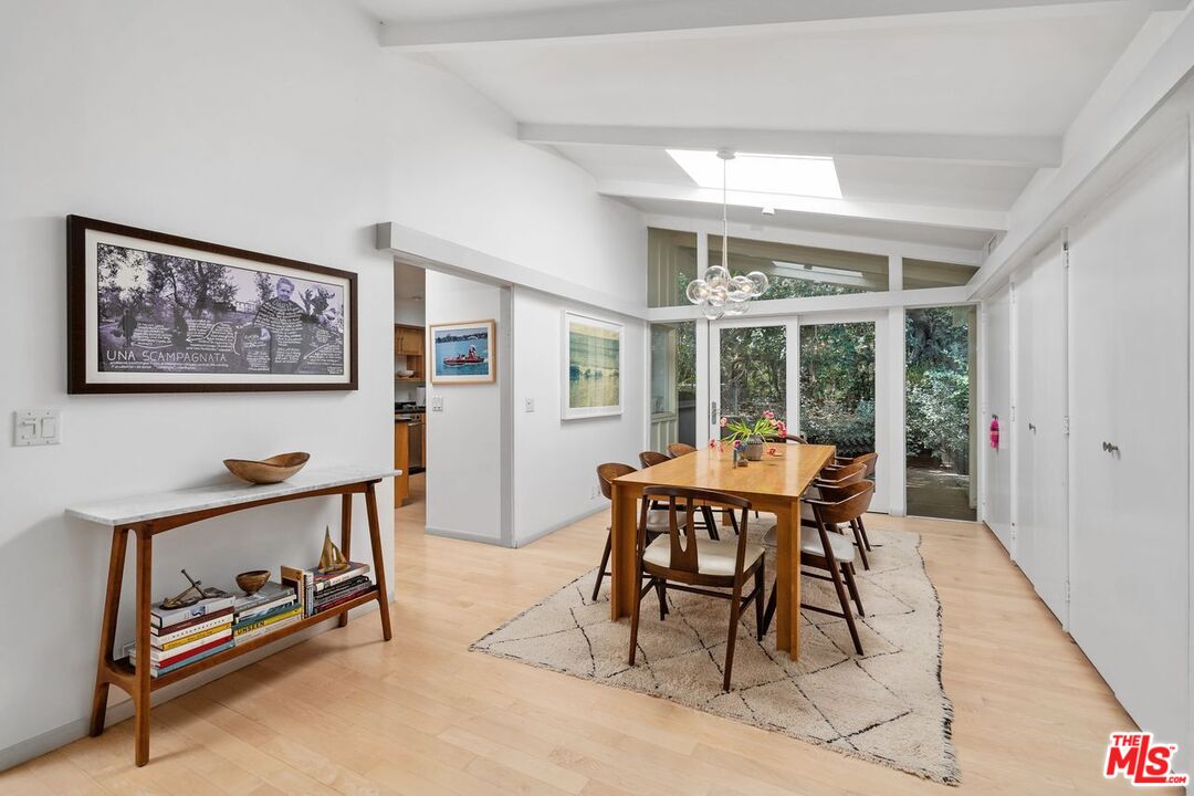 1827 Old Ranch Road Los Angeles, CA 90049 - Photo 9 of 39 a dining room with furniture and window