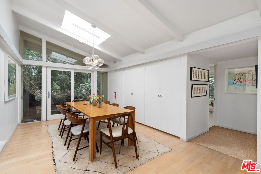 1827 Old Ranch Road Los Angeles, CA 90049 - Photo 10 of 39 a table and chairs in a room