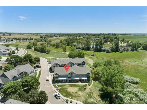 an aerial view of a house with a garden