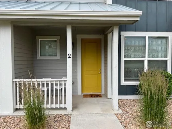 a front view of a house with a porch
