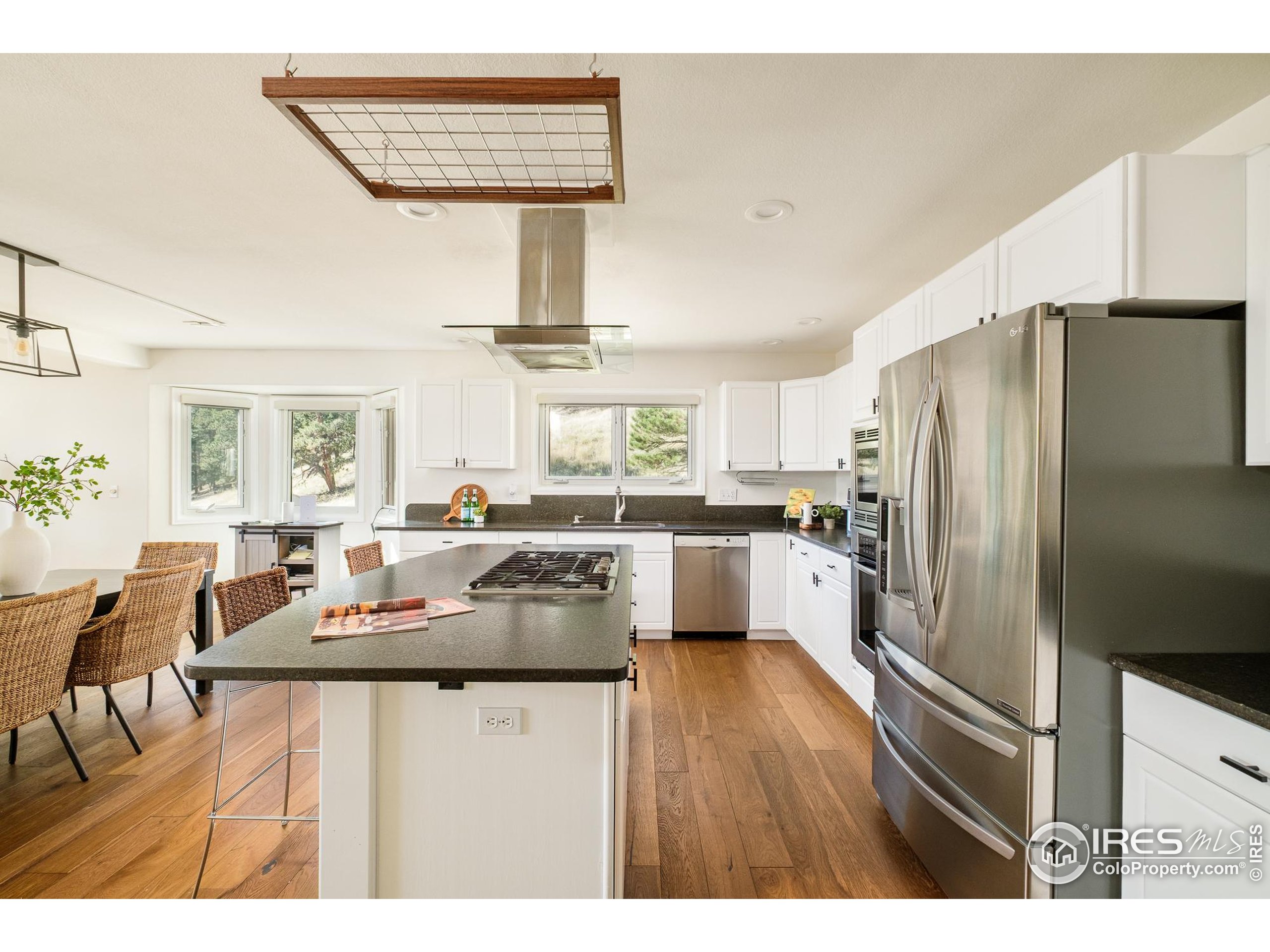 270 Canon View Road Boulder, CO 80302 - Photo 16 of 48 a kitchen with refrigerator and cabinets