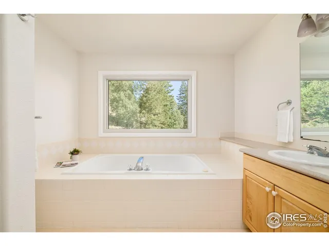 a bathroom with a sink and a bathtub