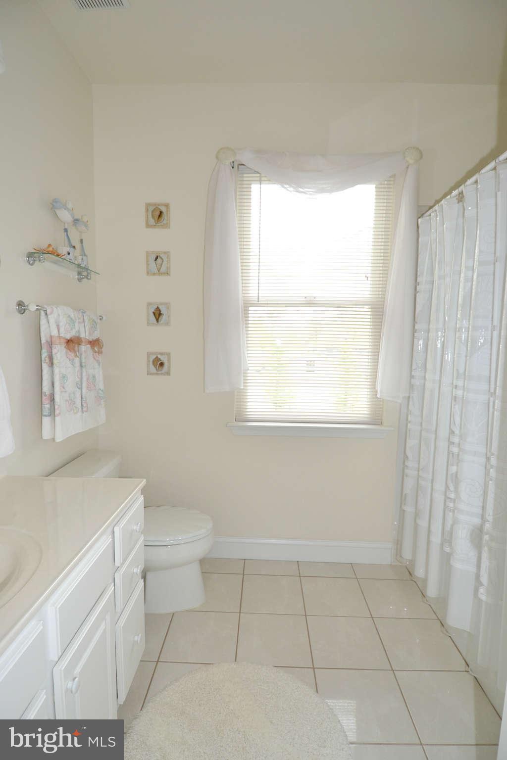 11317 Rawhide Road Lusby, MD 20657 - Photo 11 of 23 Full Hallway Bathroom
