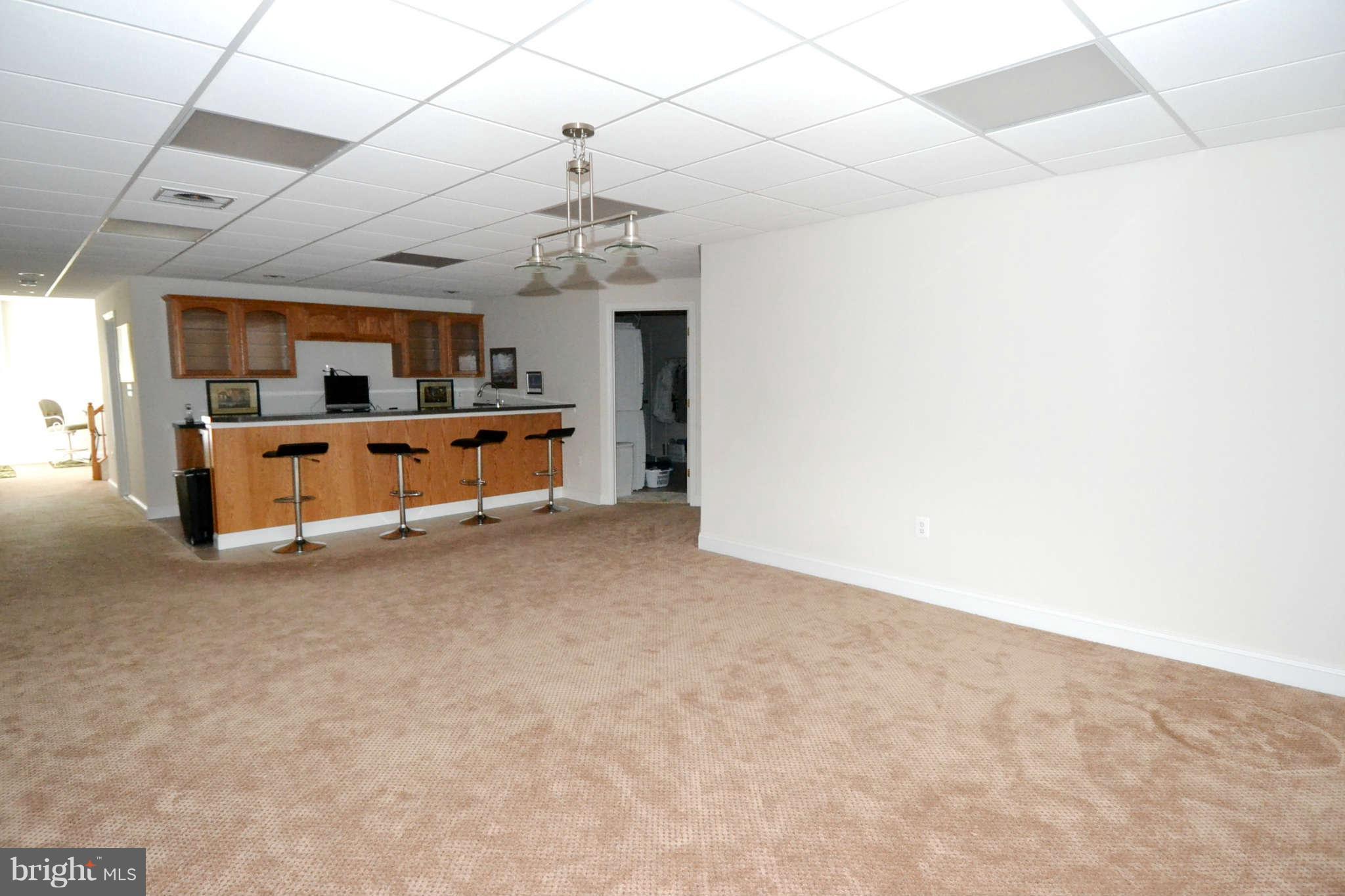 11317 Rawhide Road Lusby, MD 20657 - Photo 15 of 23 Game Room / Finished Basement