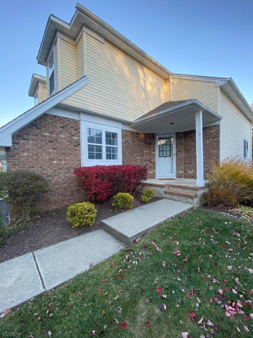 16 Mountain View Court Hamburg, NJ 07419 - Photo 19 of 21 a front view of a house with garden