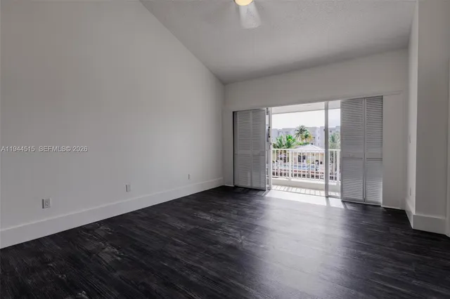 a bathroom with a toilet and shower