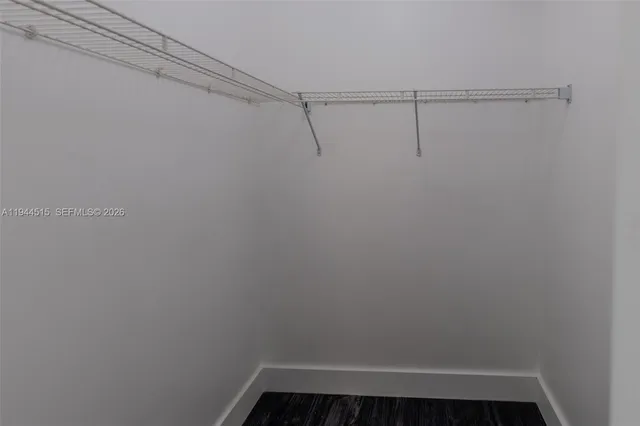 a bath room with a toilet and a bath tub