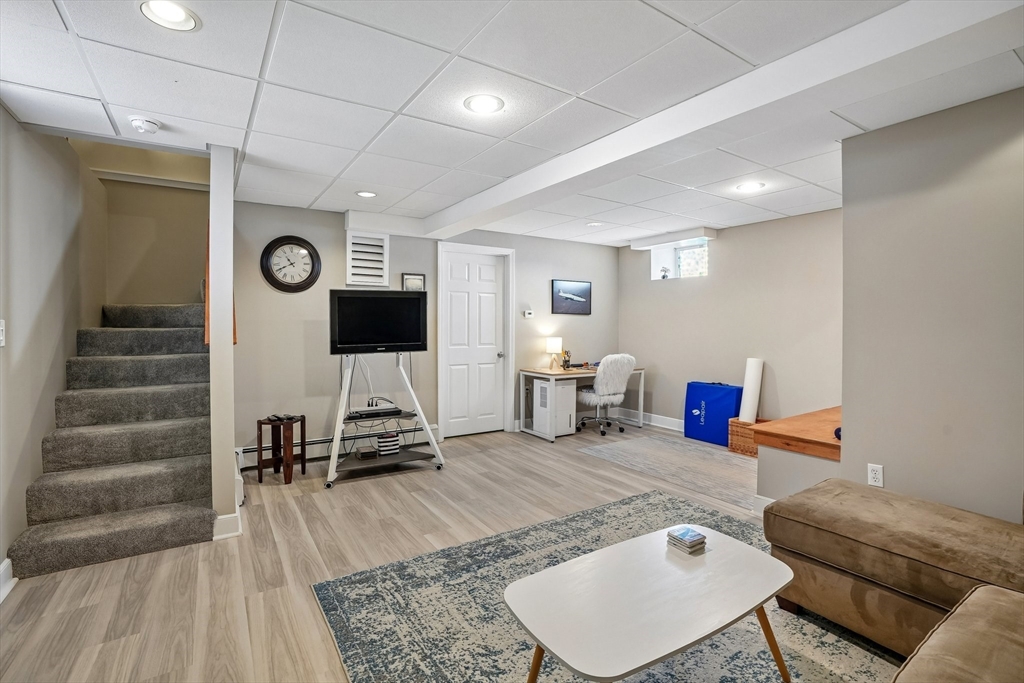 12 Hawley Road Scituate, MA 02066 - Photo 17 of 24 a living room with furniture and wooden floor