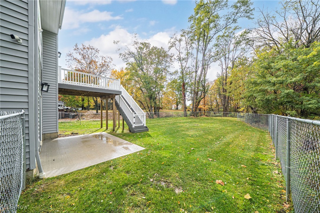5270 Brainard Road Solon, OH 44139 - Photo 41 of 45 Fenced backyard with a patio area, a deck, and stairs