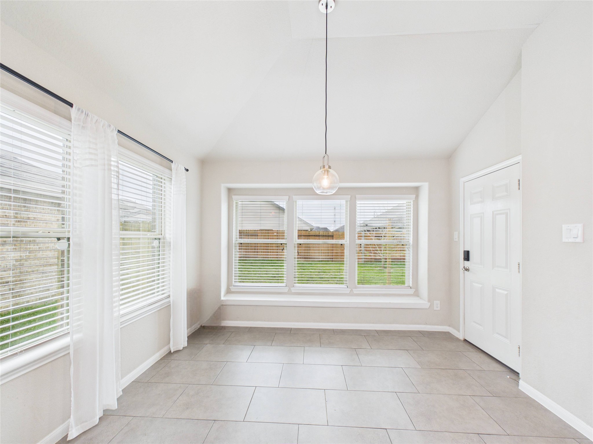 721 Rim Water Drive Alvin, TX 77511 - Photo 17 of 40 a view of an empty room with a window