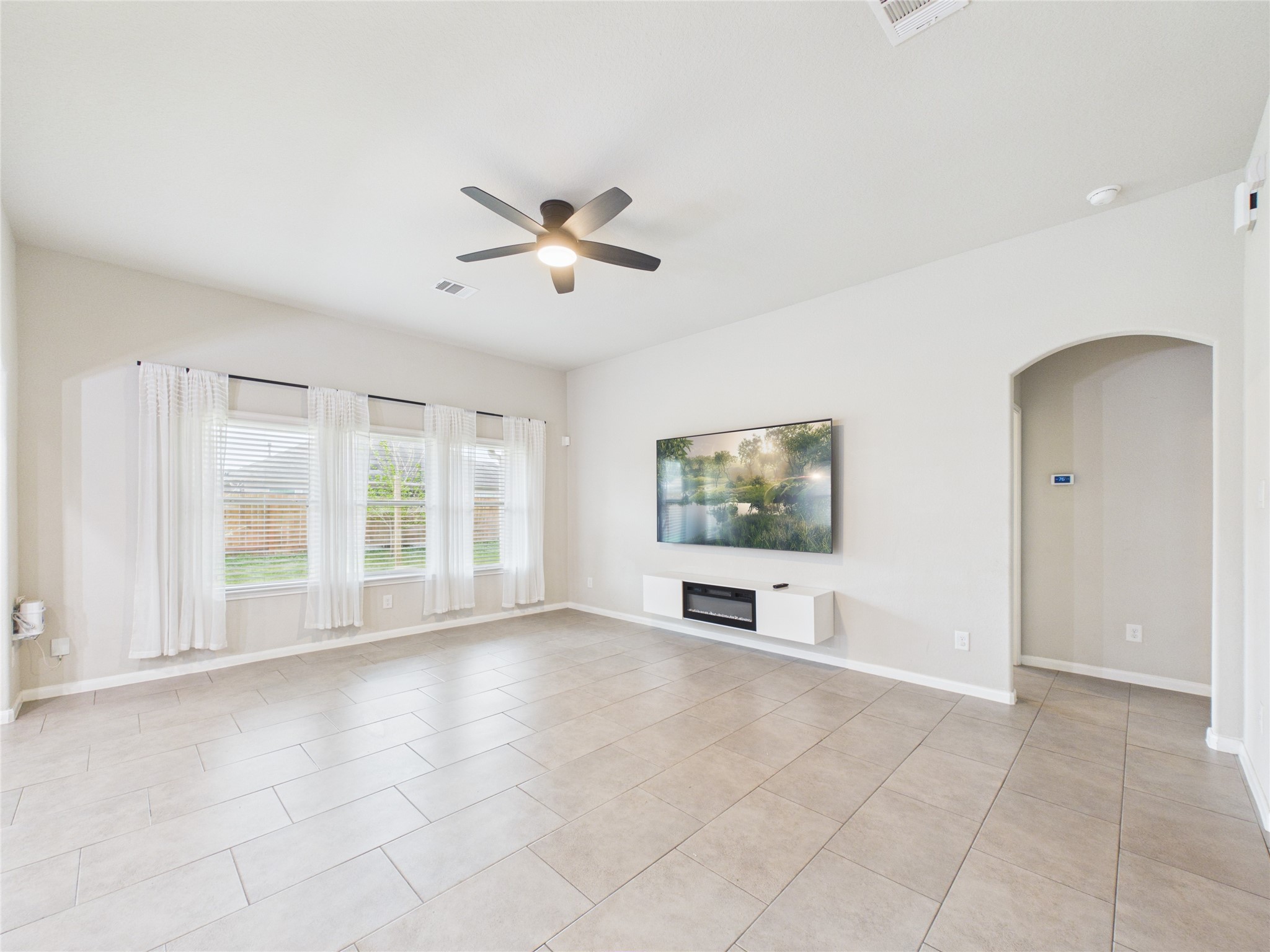 721 Rim Water Drive Alvin, TX 77511 - Photo 2 of 40 a view of an empty room with a window