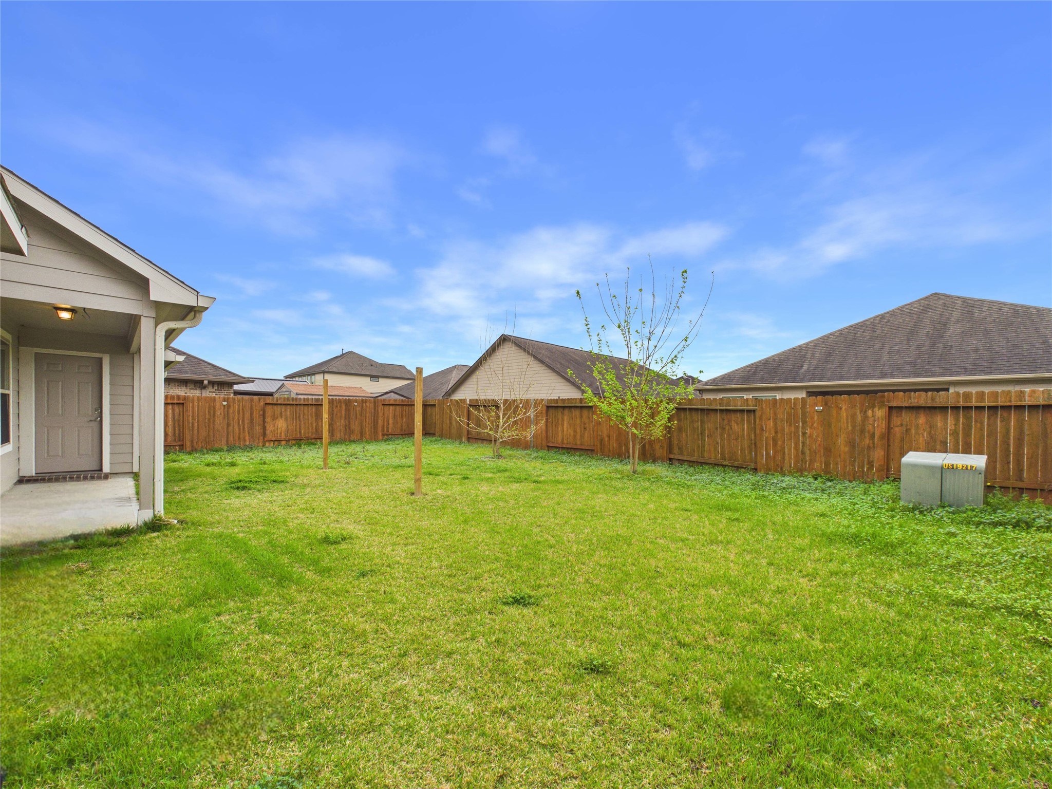 721 Rim Water Drive Alvin, TX 77511 - Photo 31 of 40 a view of a house with backyard and garden