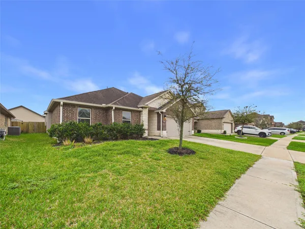 a house view with a garden space