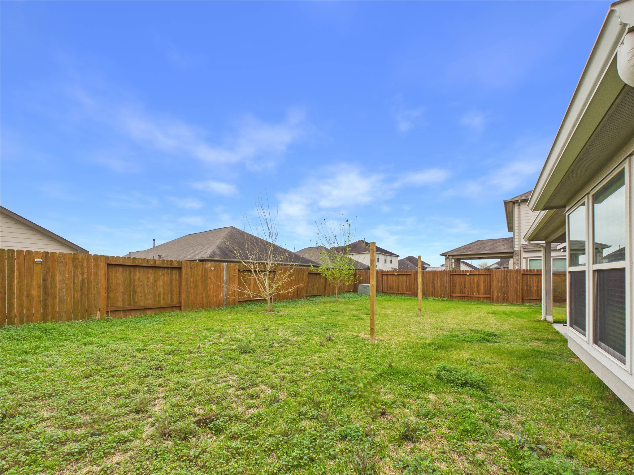 721 Rim Water Drive Alvin, TX 77511 - Photo 36 of 40 a view of an outdoor space with a garden