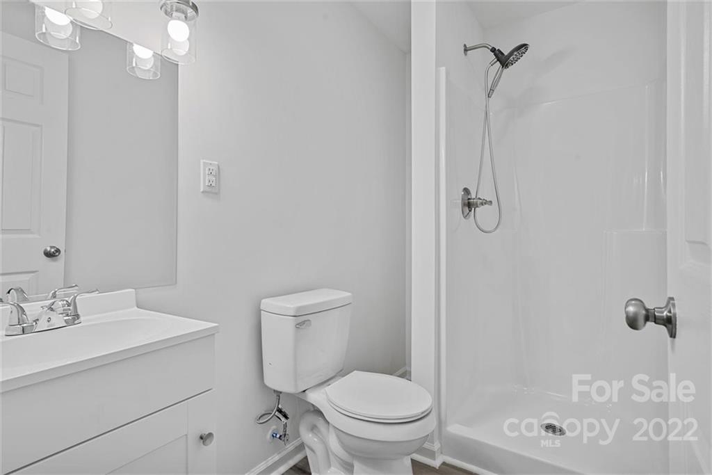 500 3rd Street Stanley, NC 28164 - Photo 13 of 19 a bathroom with a sink a toilet and shower