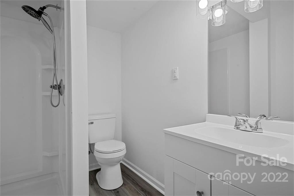 500 3rd Street Stanley, NC 28164 - Photo 16 of 19 a bathroom with a sink toilet and shower
