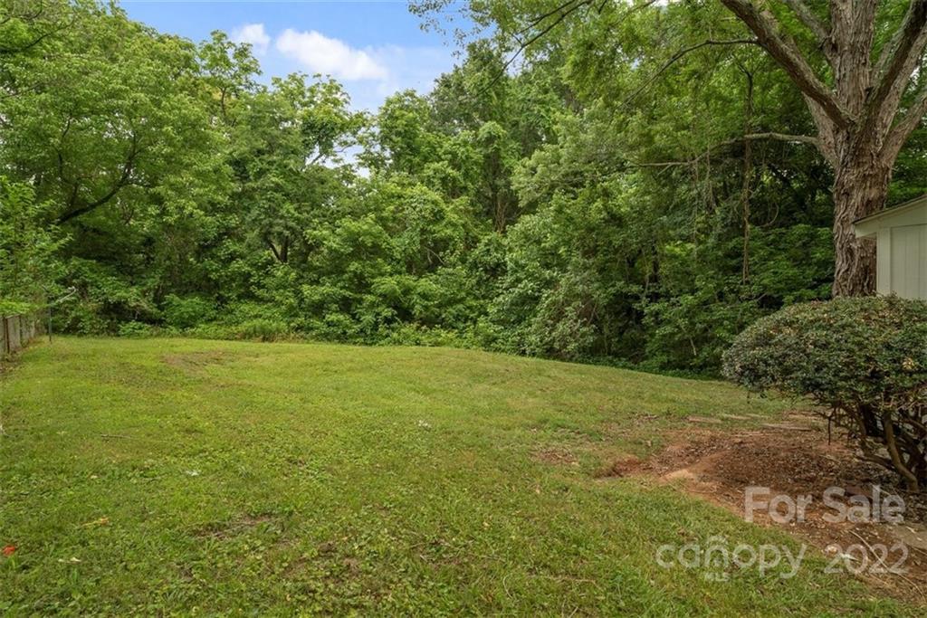 500 3rd Street Stanley, NC 28164 - Photo 17 of 19 a view of a field with an trees