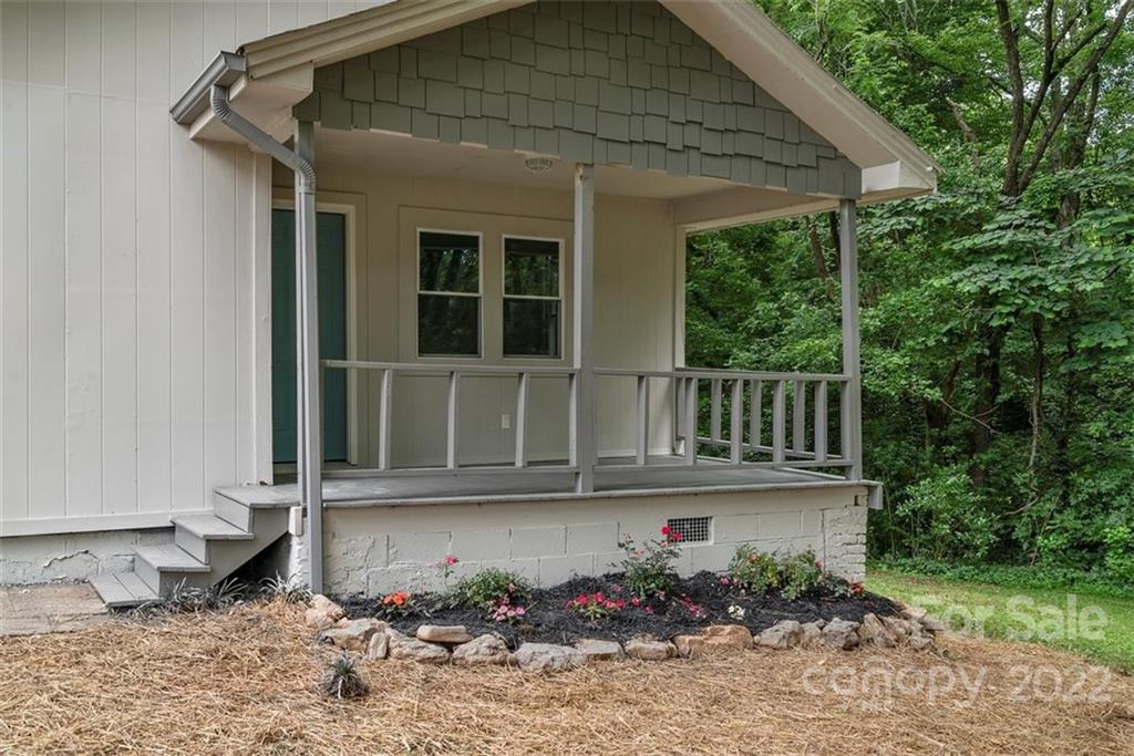 500 3rd Street Stanley, NC 28164 - Photo 3 of 19 a front view of a house with garden
