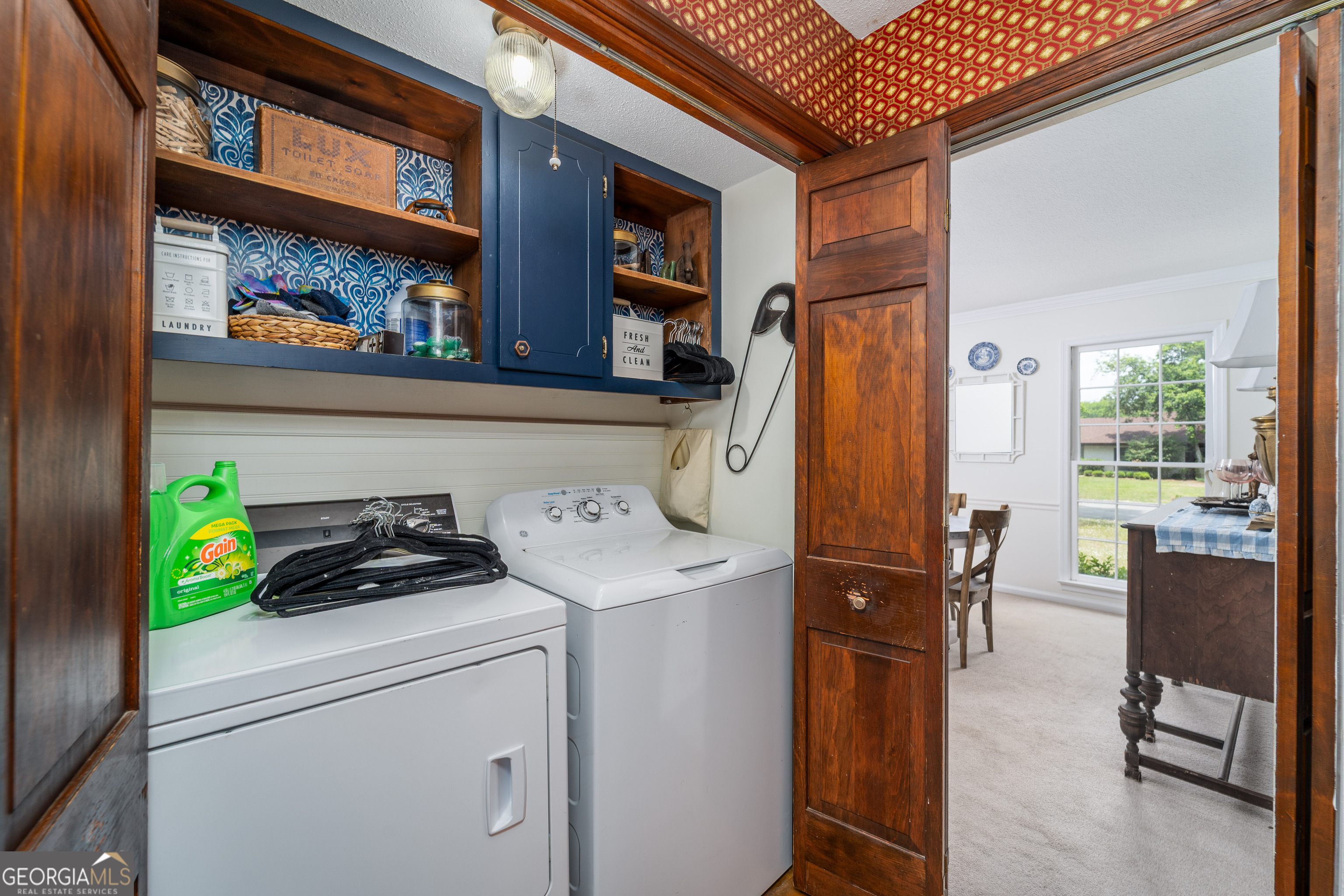 1312 Atlantic Avenue Waycross, GA 31501 - Photo 14 of 34 a utility room with dryer and washer