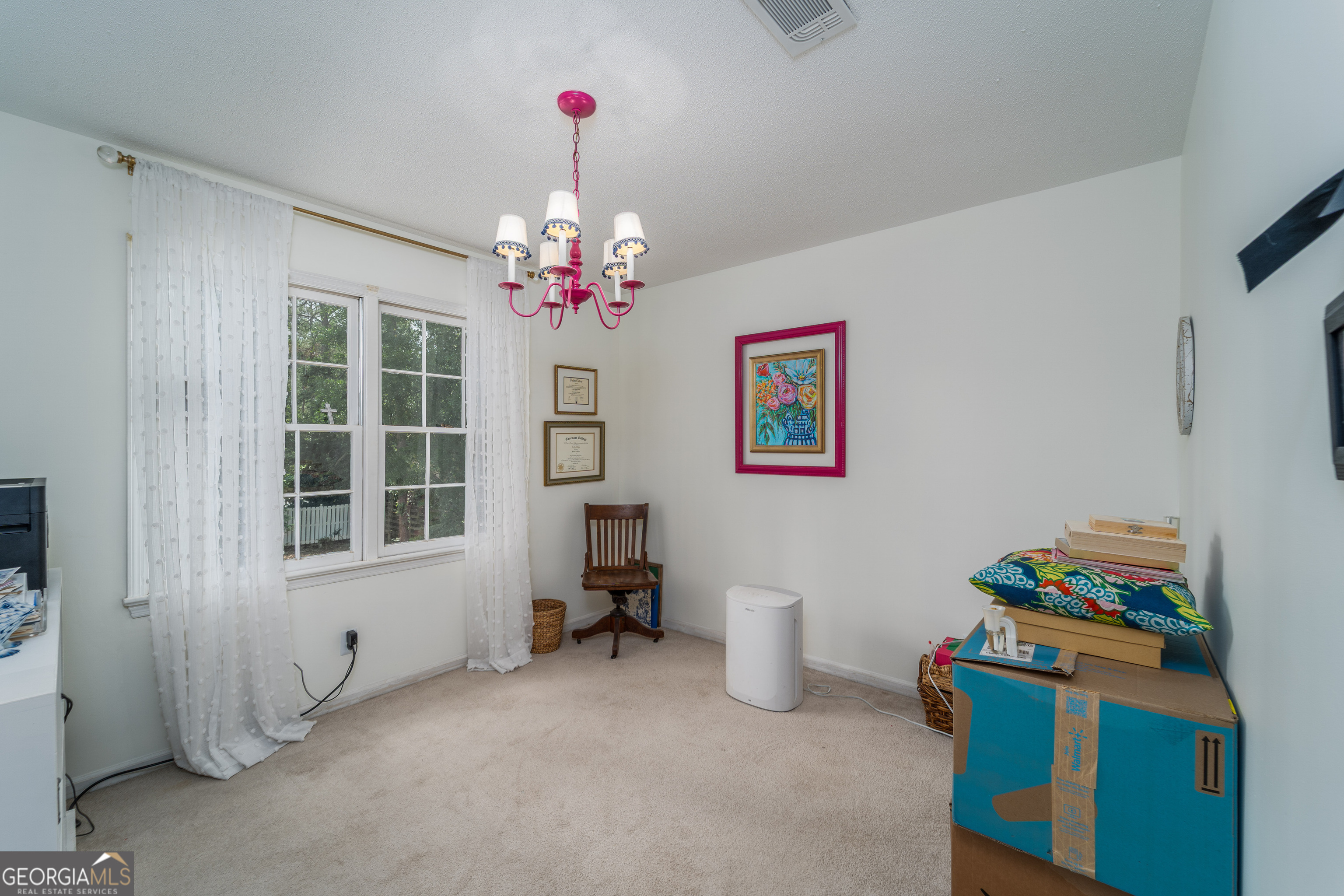 1312 Atlantic Avenue Waycross, GA 31501 - Photo 25 of 34 a living room with furniture and a window