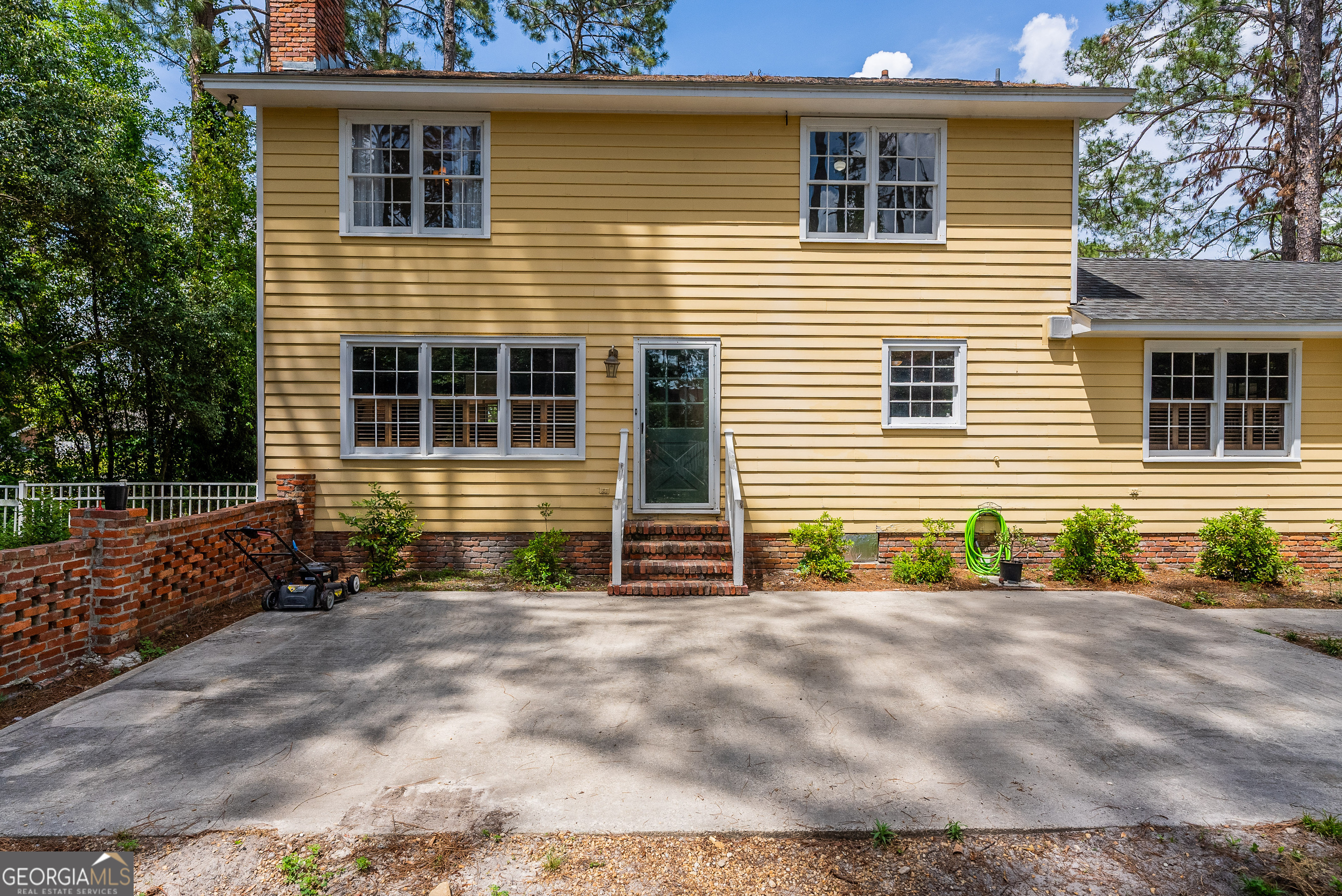 1312 Atlantic Avenue Waycross, GA 31501 - Photo 29 of 34 a view of front of a house with garage