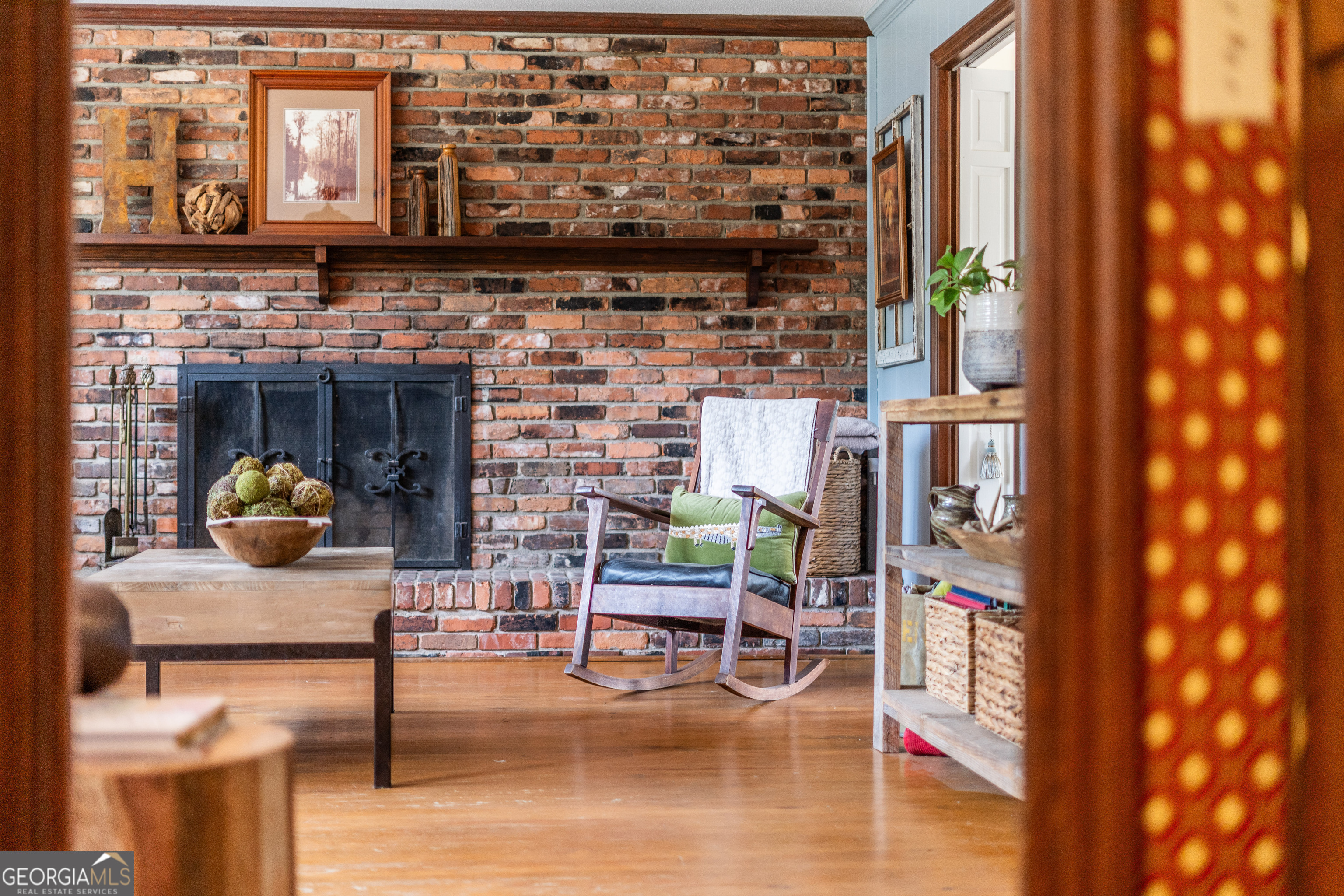 1312 Atlantic Avenue Waycross, GA 31501 - Photo 5 of 34 a living room with furniture and a fireplace