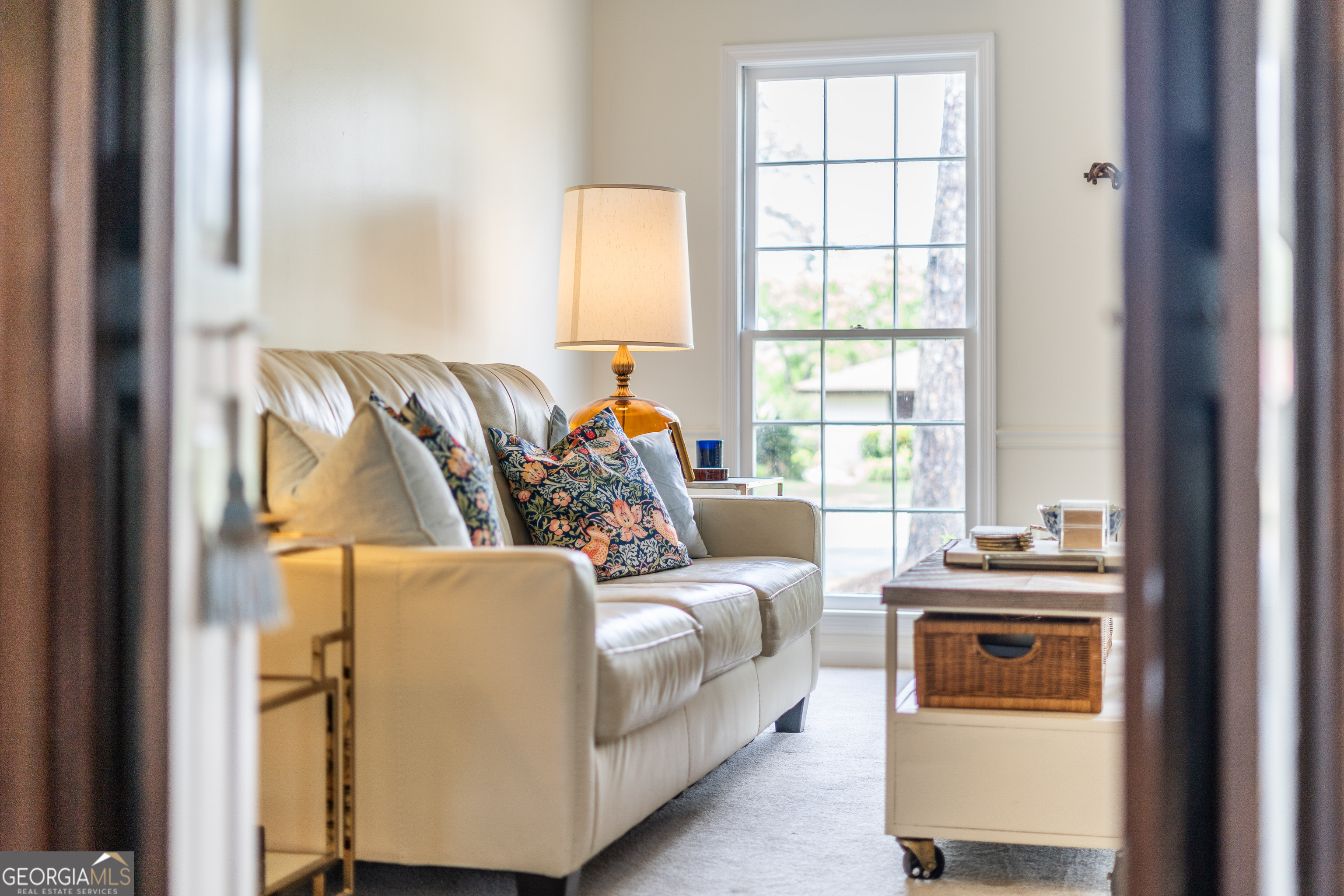 1312 Atlantic Avenue Waycross, GA 31501 - Photo 6 of 34 a living room with furniture and a window